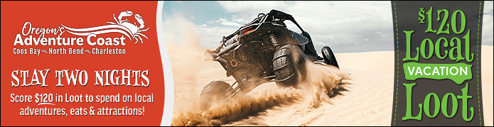 ATV in dunes with $120 in Local Vacation Loot promotion